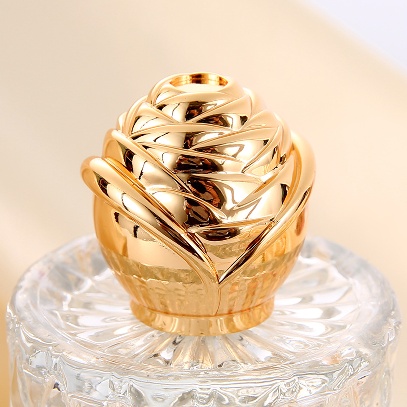 Zinc Alloy Die Casting Golden Blossom Shaped Perfume Bottle Cap Essential Oils Dropper Container Cap Customized Mfg